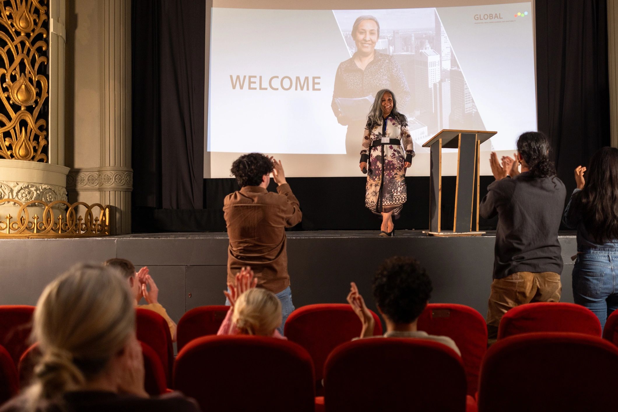Corporate event presentation with engaged audience