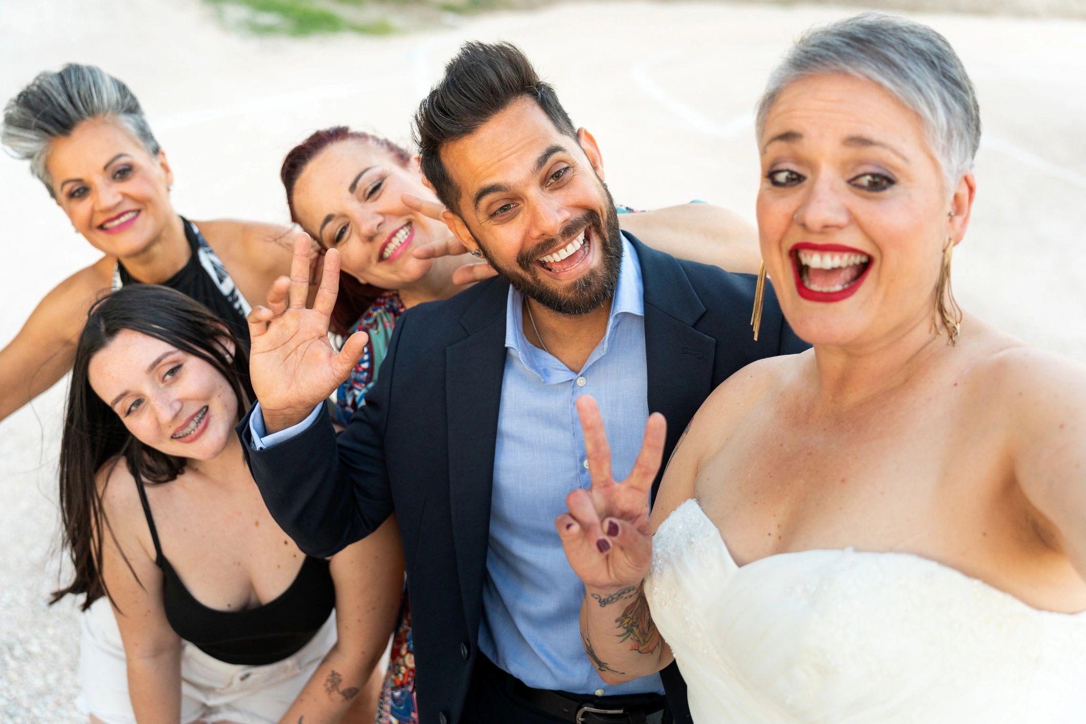 Bride and friends celebrating at a wedding reception